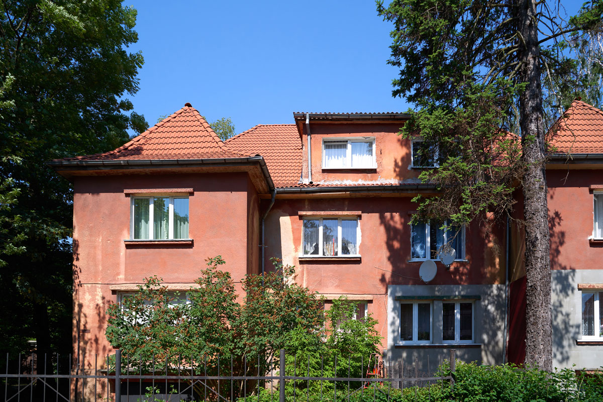 Old red german design house in front in the Kaliningrad city