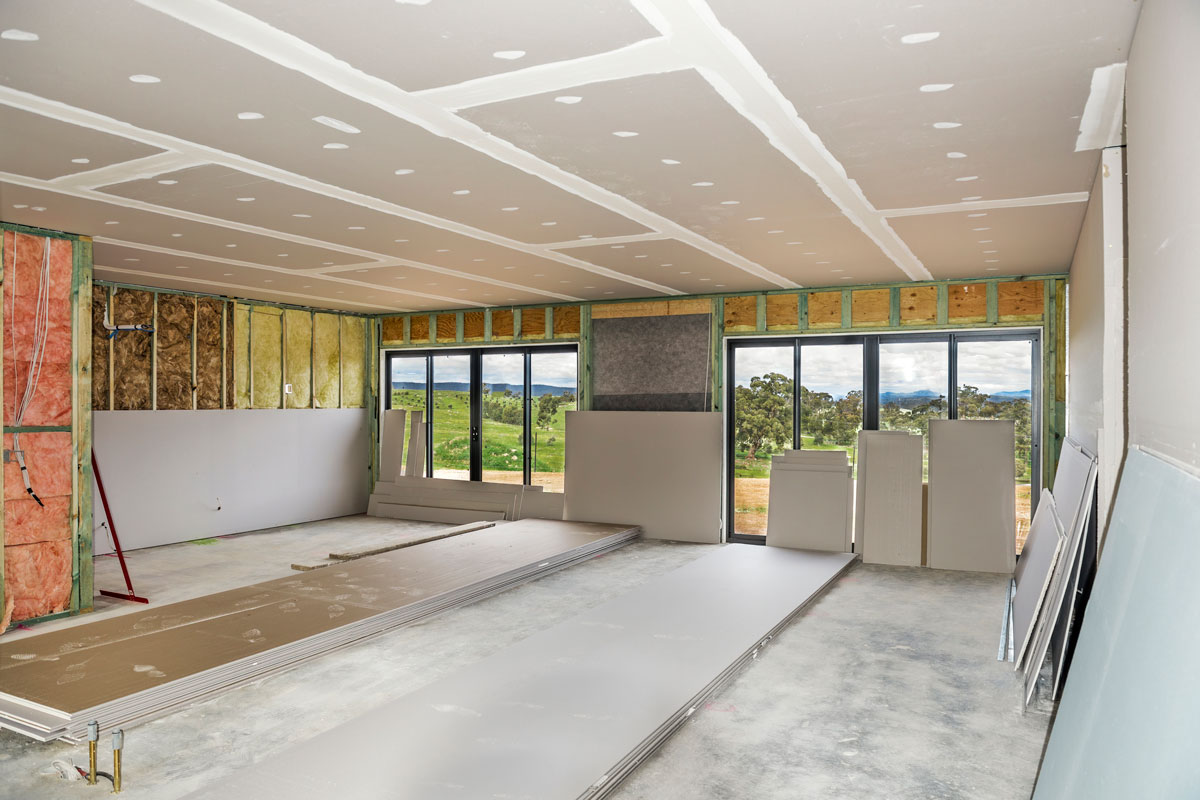 Residential home interior with insulation and plasterboard