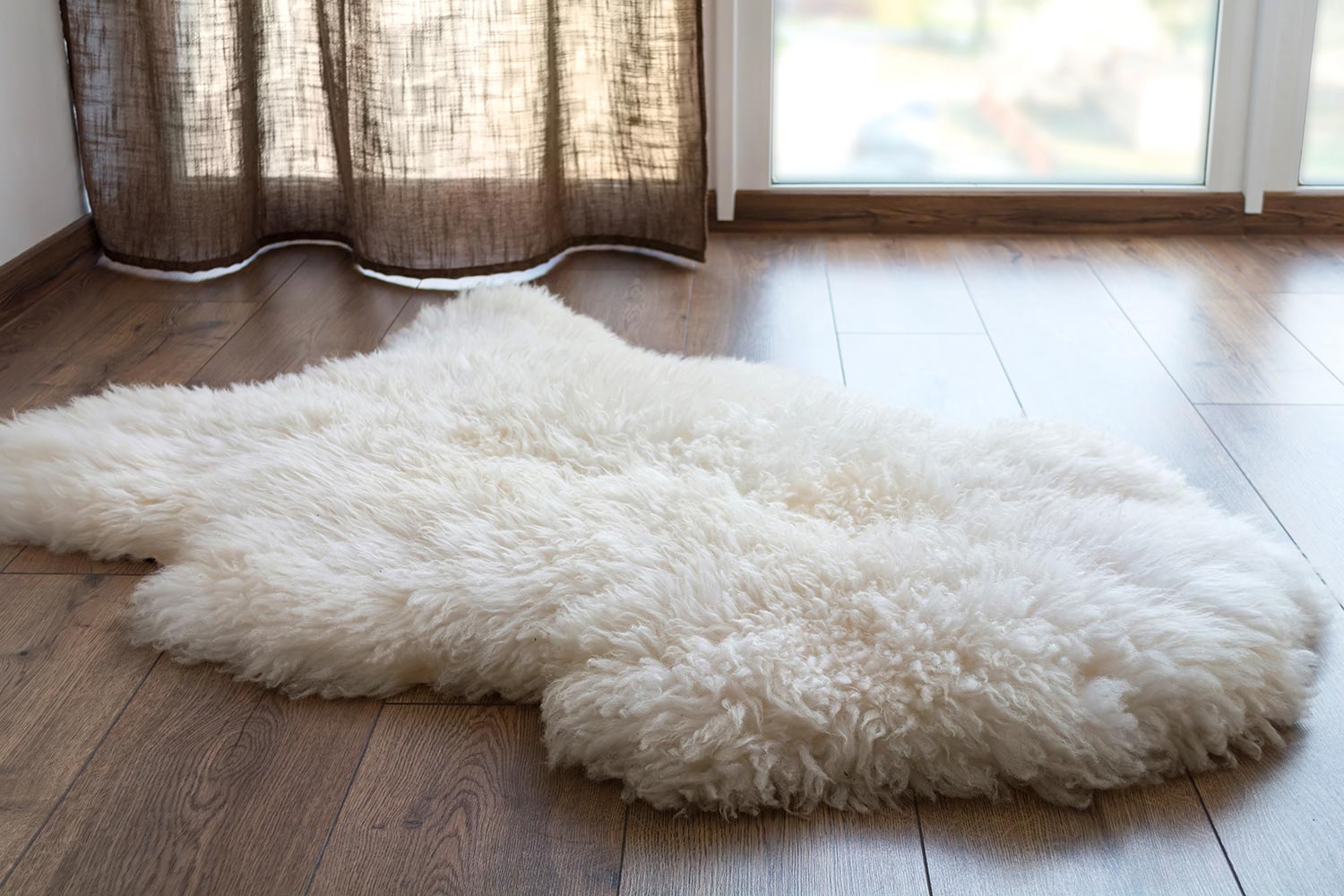 Sheep skin on the laminate floor in the room