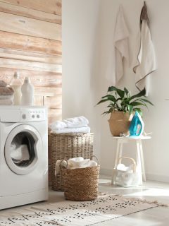 Stylish room interior with modern washing machine, Kenmore Washer Not Spinning Clothes Dry - What To Do?