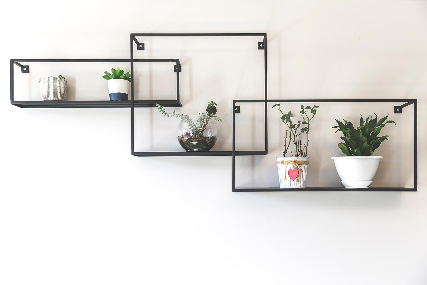 Three decorative metal rectangular and square shape shelves