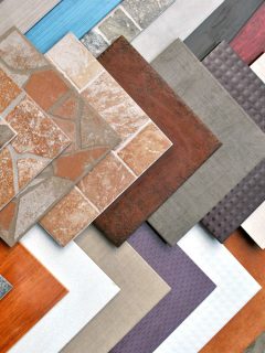 Various decorative tiles samples. - What Tile Goes With Wood Floors?