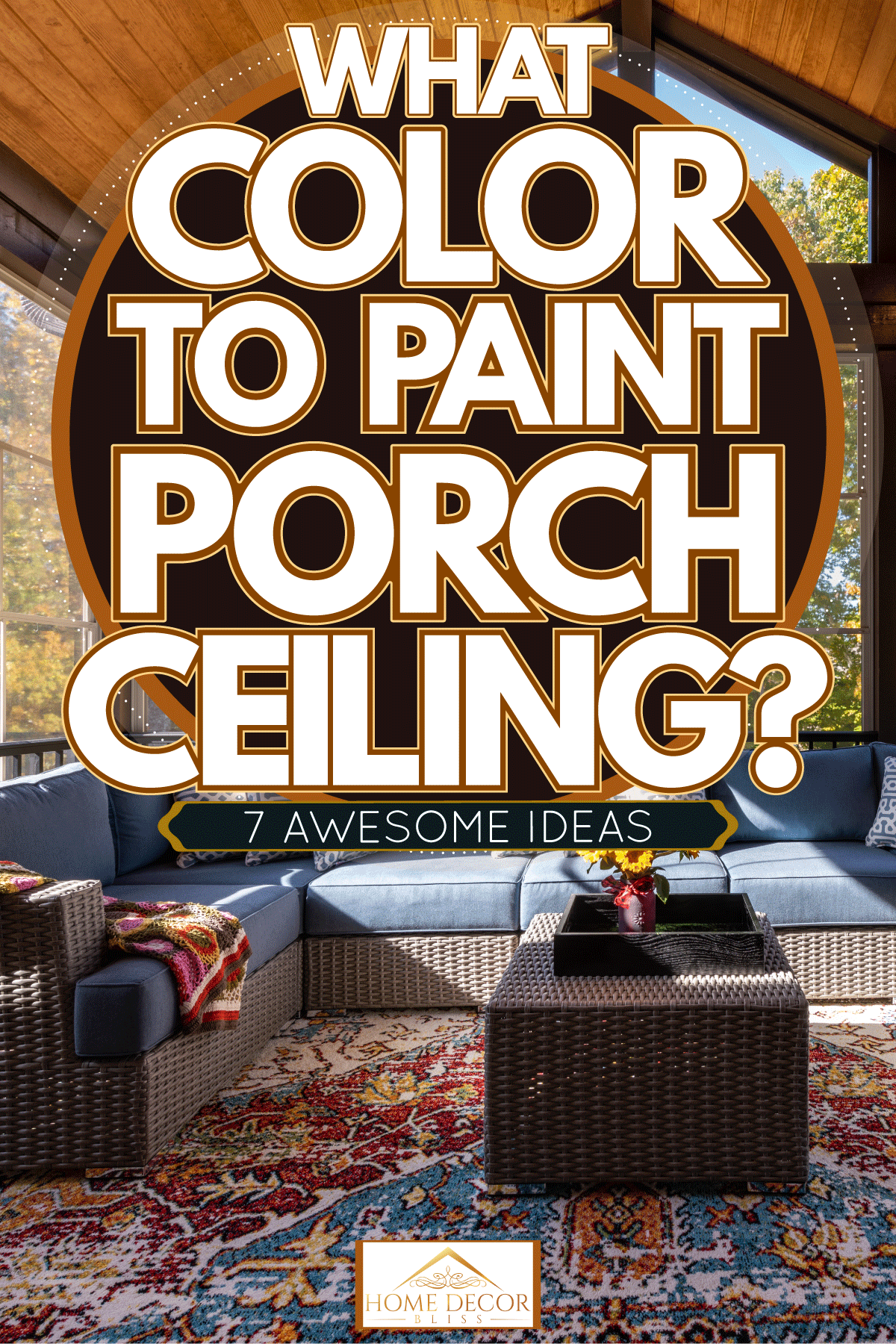 A classic rustic themed porch with wicker sofas matched with blue foam and throw pillows, What Color To Paint Porch Ceiling? [7 Awesome Ideas!]