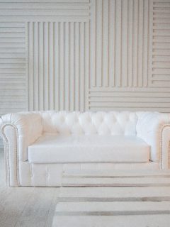 A white leather sofa in the room with lamp, How To Remove Stains From White Leather Sofa [Inc. Faux Leather]