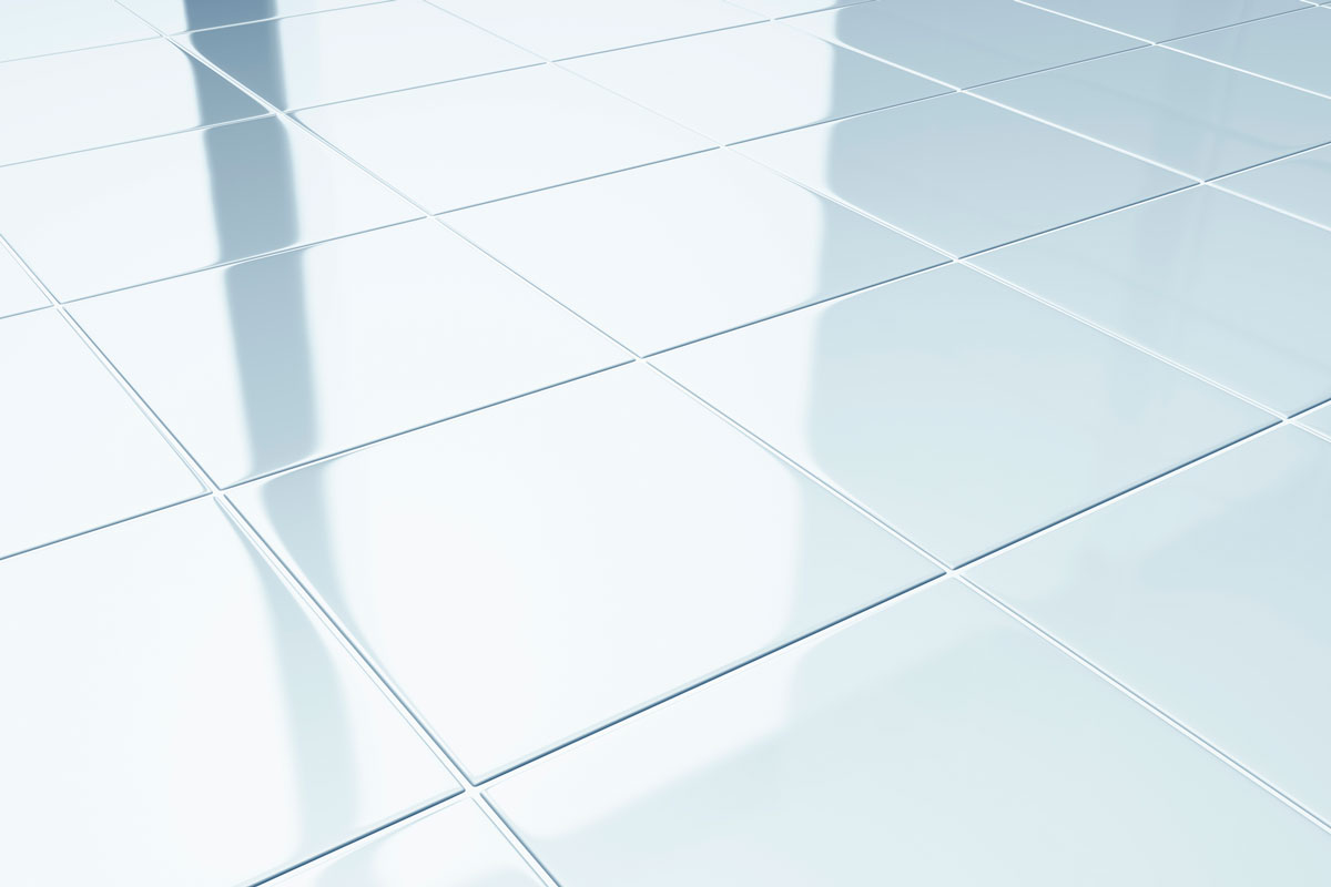 White tiles on a floor in bathroom