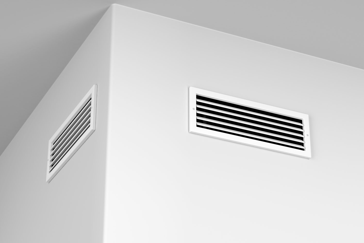 White wall vents at a white wall