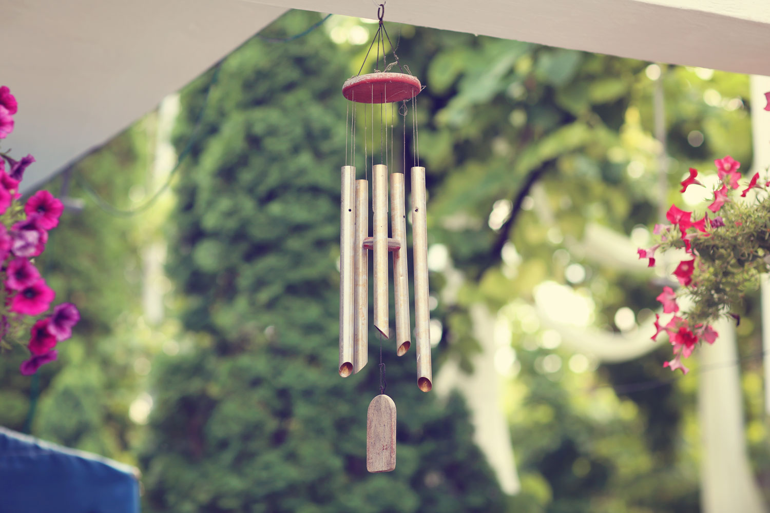 Wind chimes hanged outside the garden