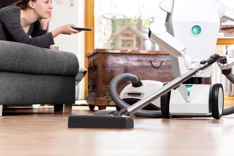 A woman is enjoying her leisure while a robot is doing the work in the household, Can Amazon Astro Climb Stairs?