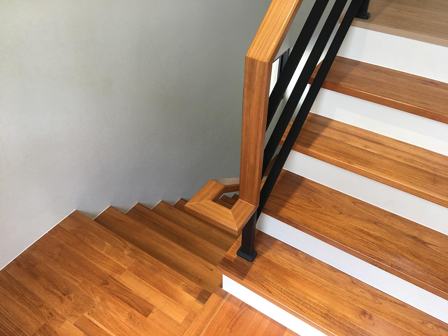 Wood stair with steel railing