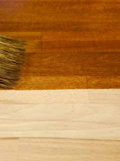 Wood texture and paintbrush housework background - Can You Use Water-Based Stain Over Oil-Based Stain
