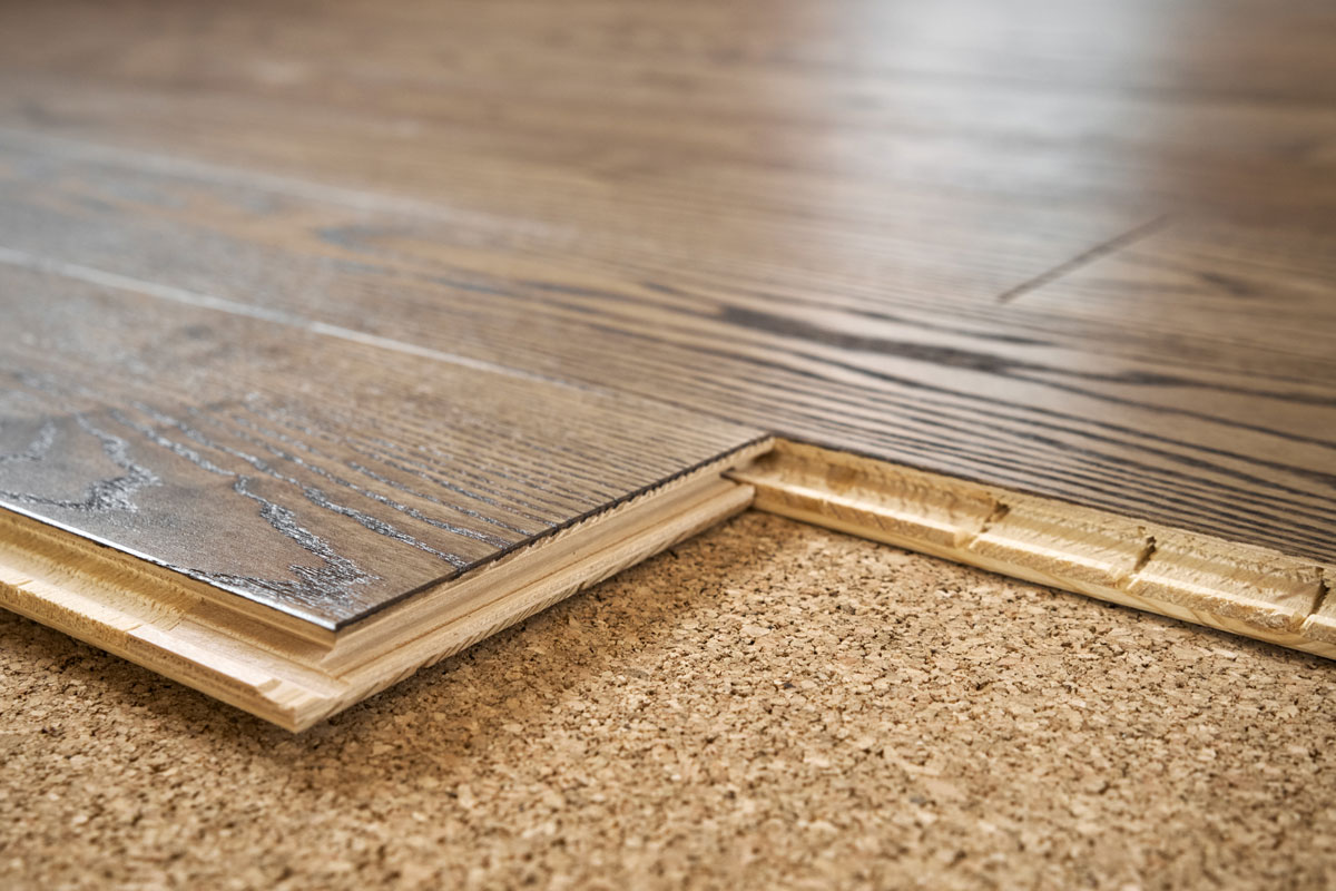 Wooden planks of flooring and cork flooring