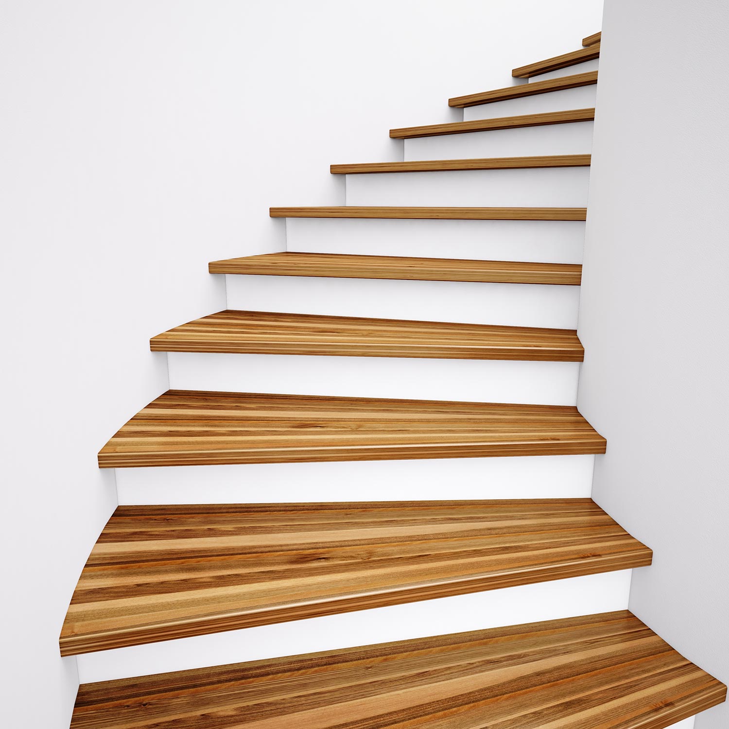 Wooden stairs and white wall leading up