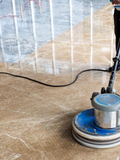 Worker cleaning marble floor using polishing machine, How To Restore Shine To Marble Floors