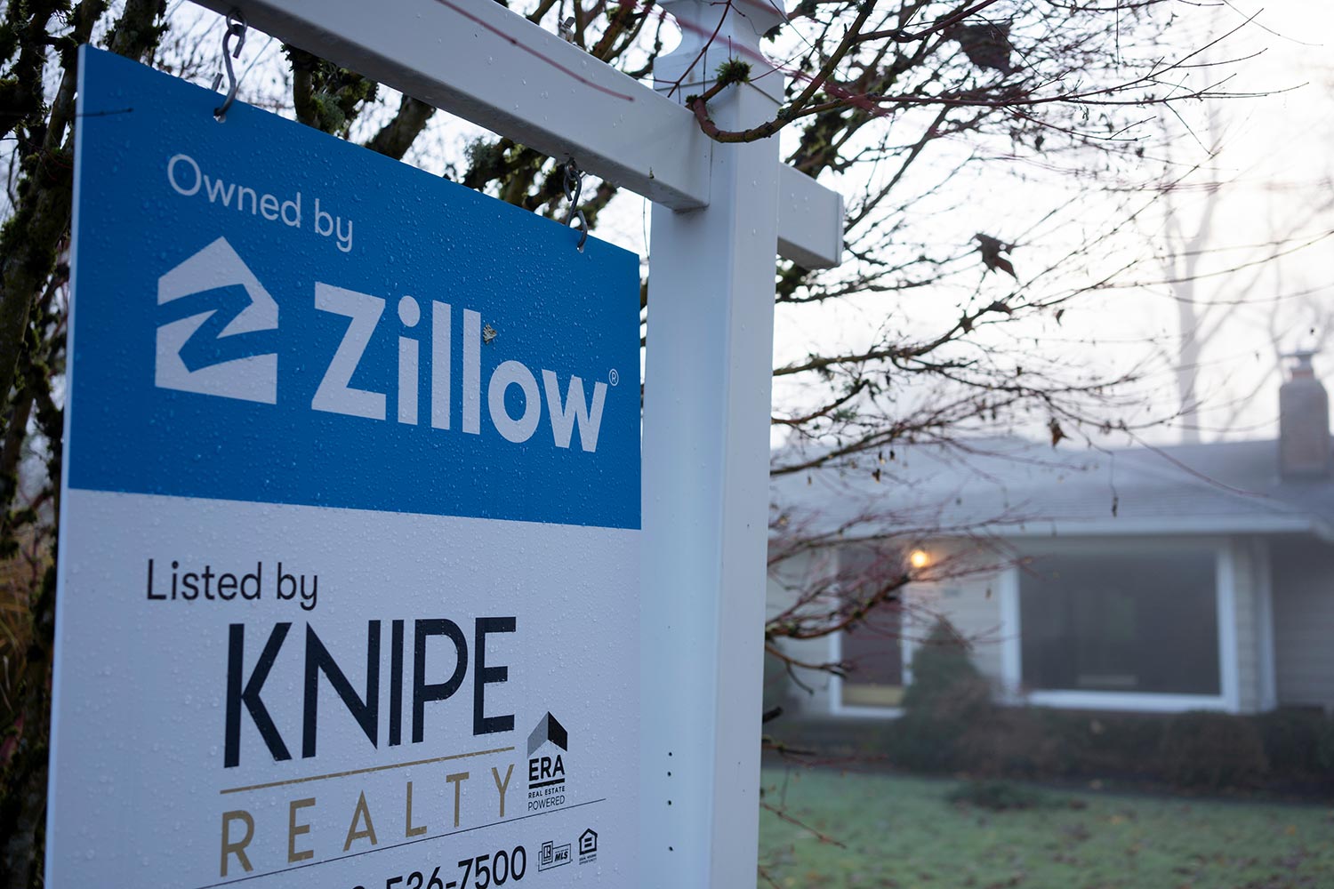 Zillow sign is seen outside a single-family home for sale in West Linn