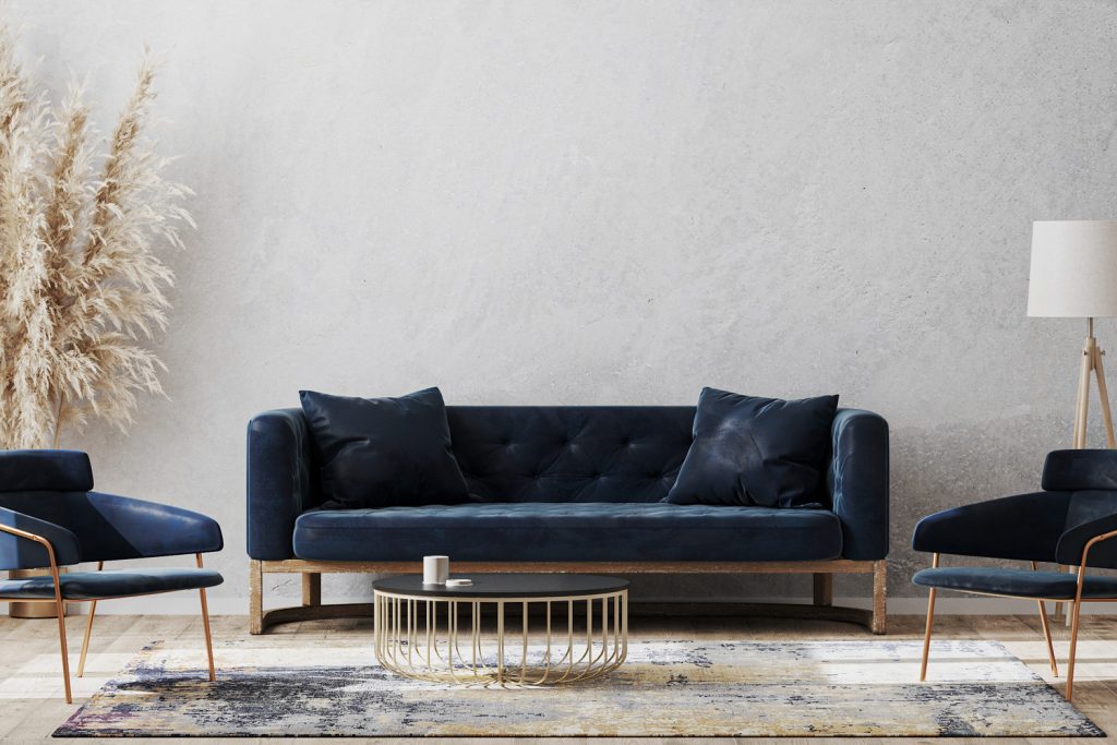modern living room mock up with dark blue sofa, armchairs near coffee table, modern rug, floor lamp and empty gray wall, luxury living room interior background