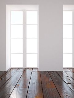 white empty interior with two windows and a dark oak wood flooring, 15 Gorgeous Dark Oak Flooring Ideas