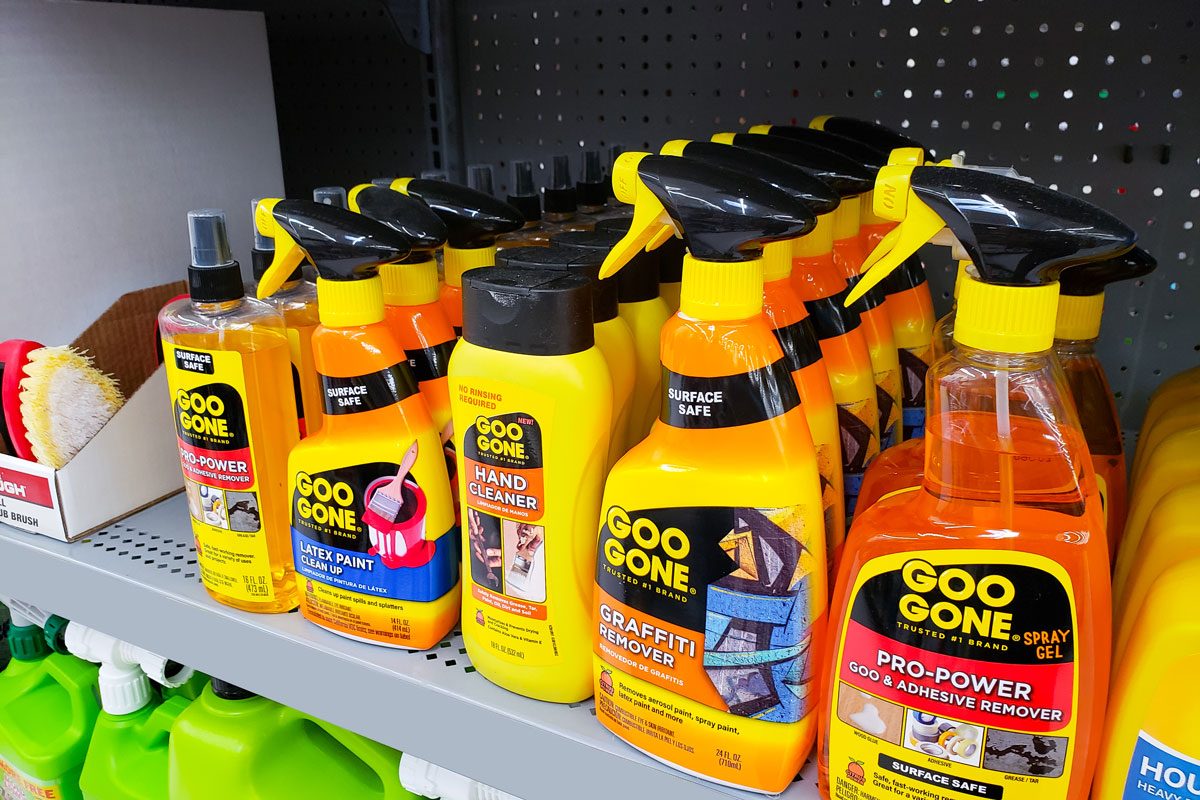 A shelf full of Goo Gone containers