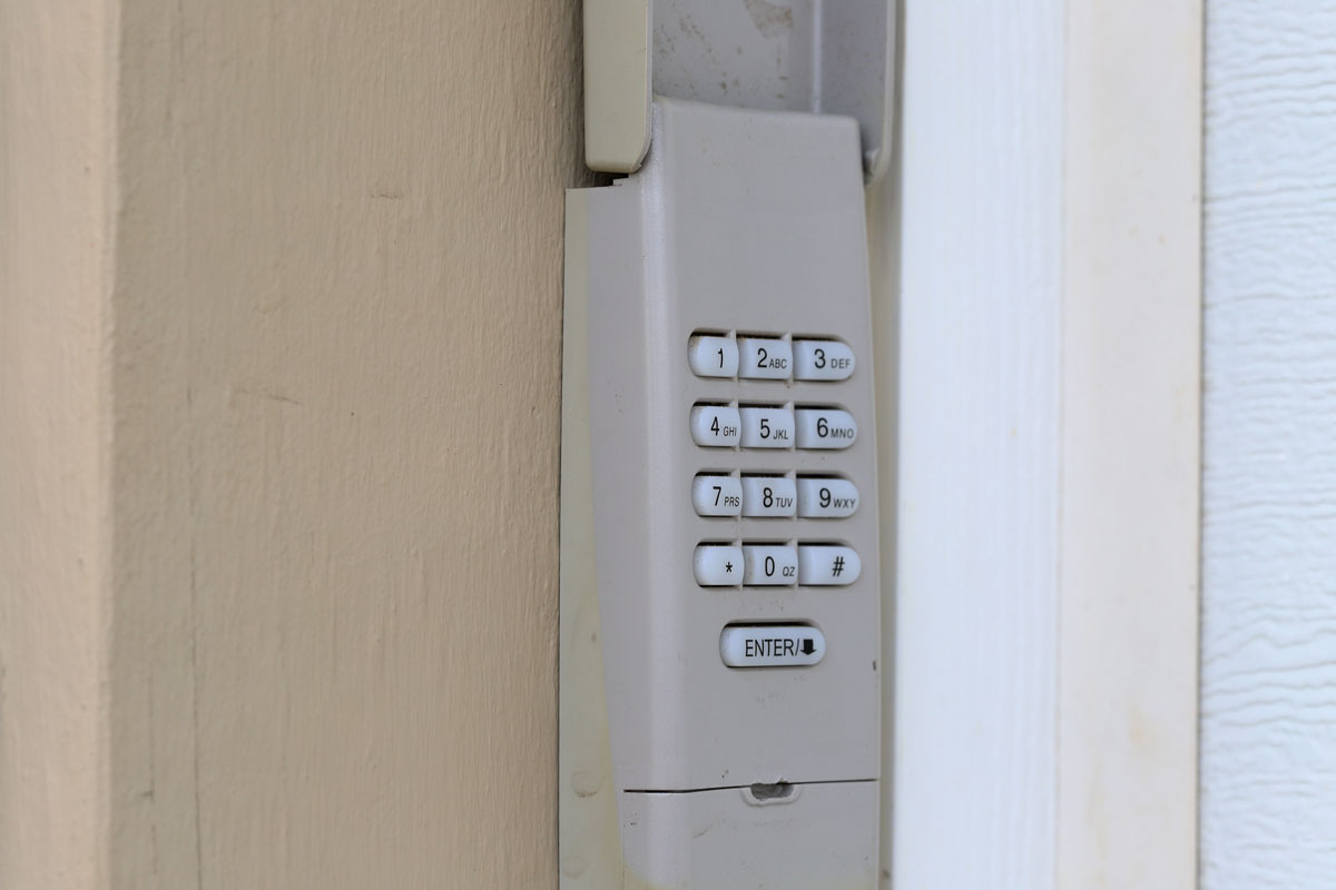An outdated door keypad