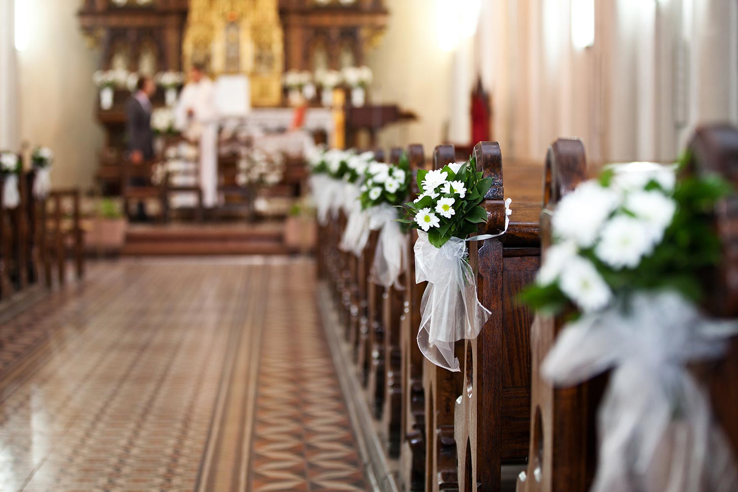 Church decorated with flower bouquets during the Wedding ceremony