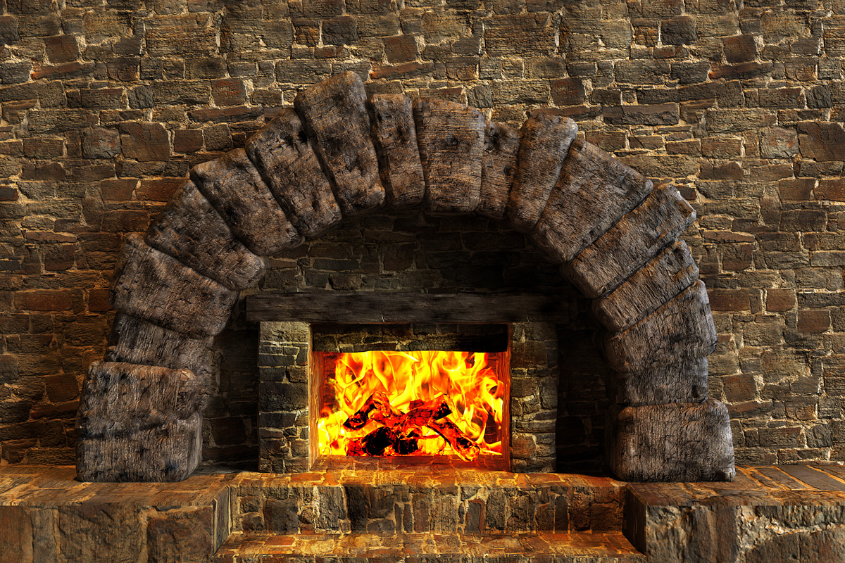 Classic isolated rustic fireplace made of stones lit with orange fire flames. 