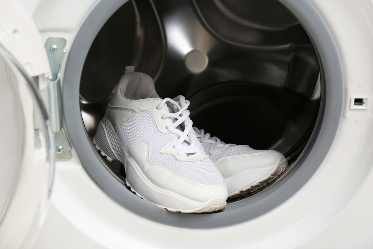 Clean sports shoes in washing machine drum