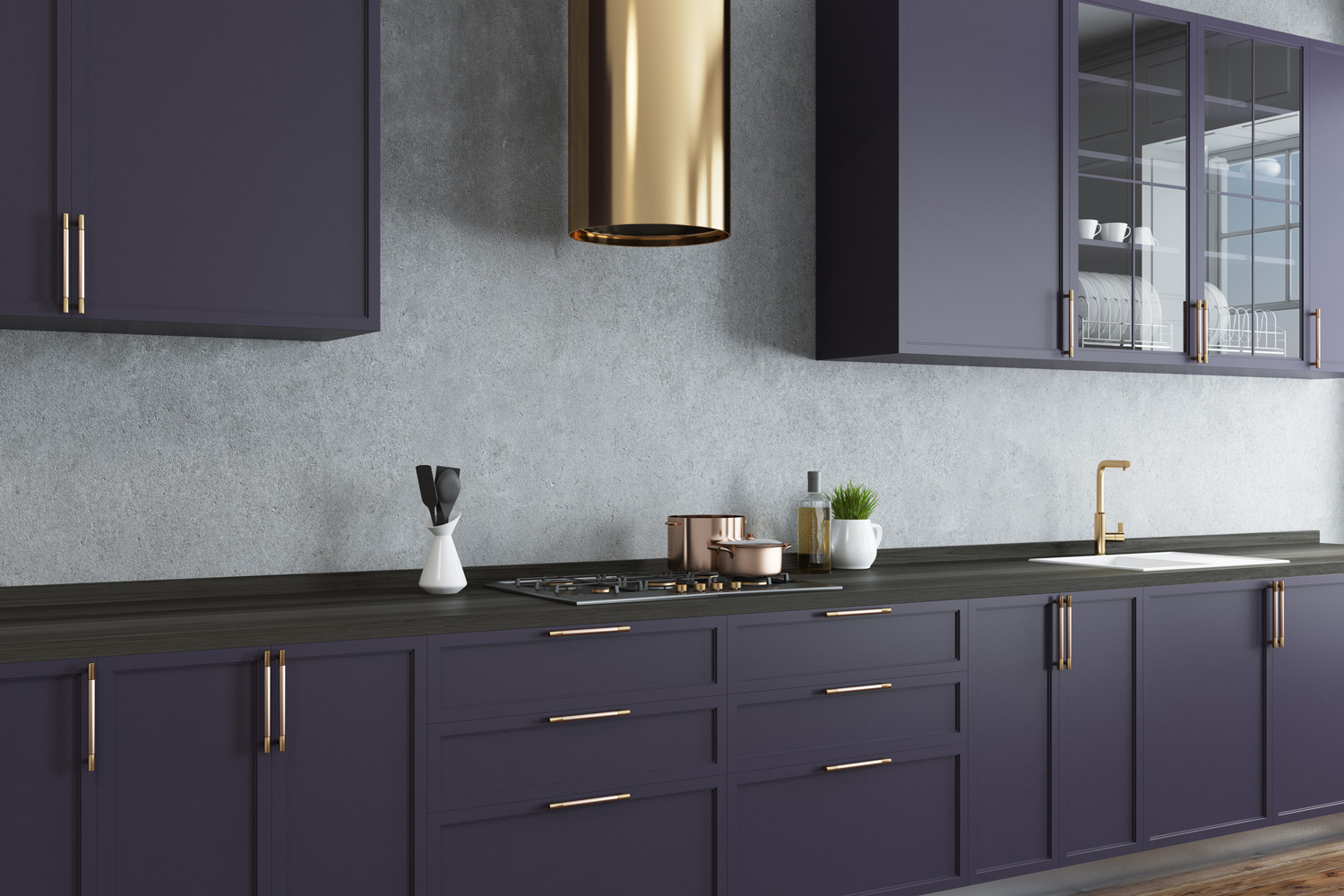 Concrete wall kitchen corner with a wooden floor and dark purple countertops.