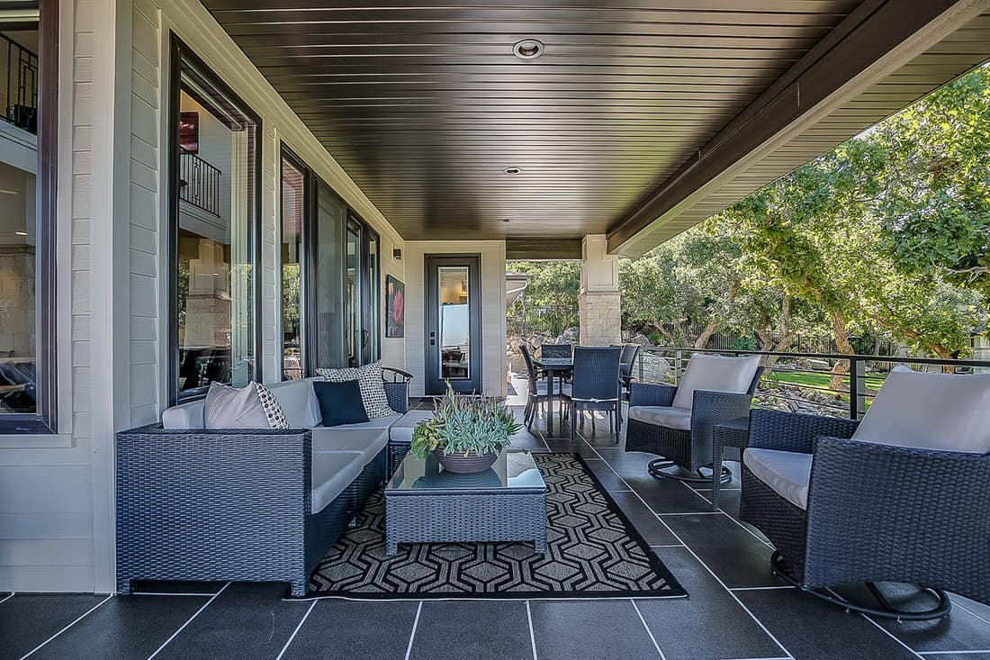 Covered patio deck with an ample amount of seating