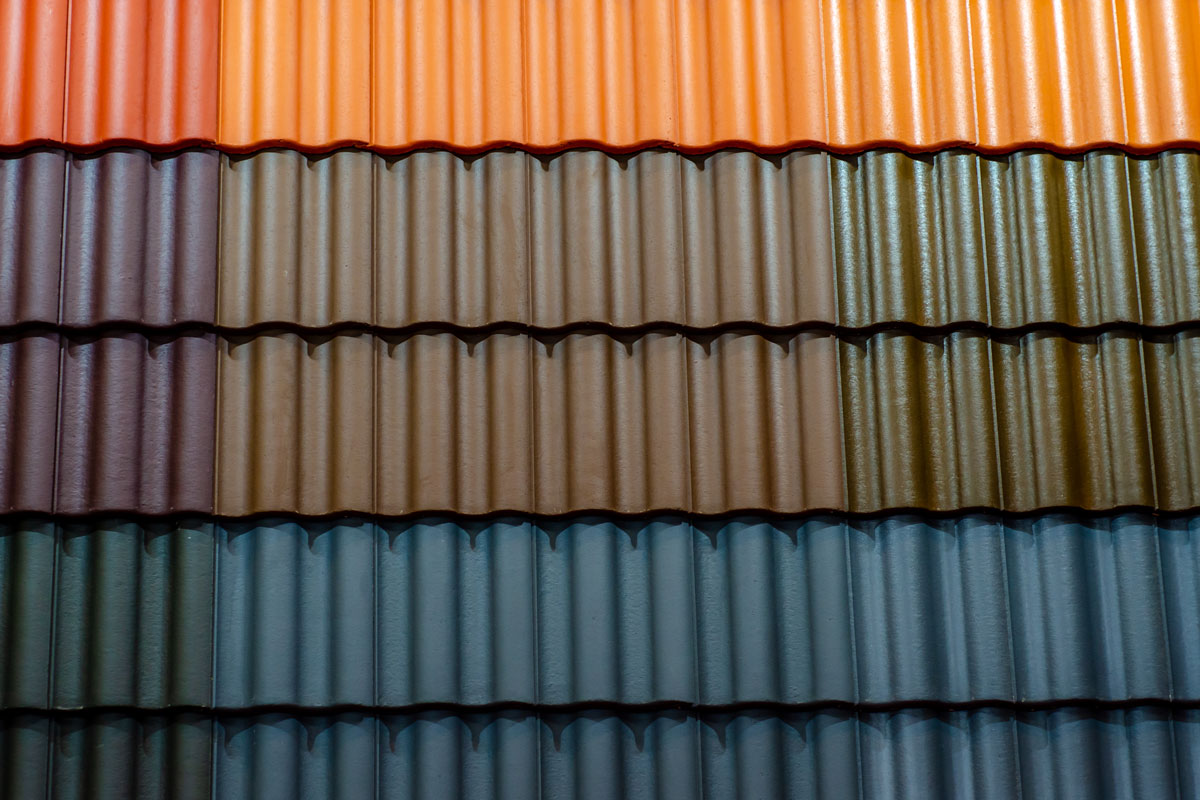 Different colors of metal roofing stacked
