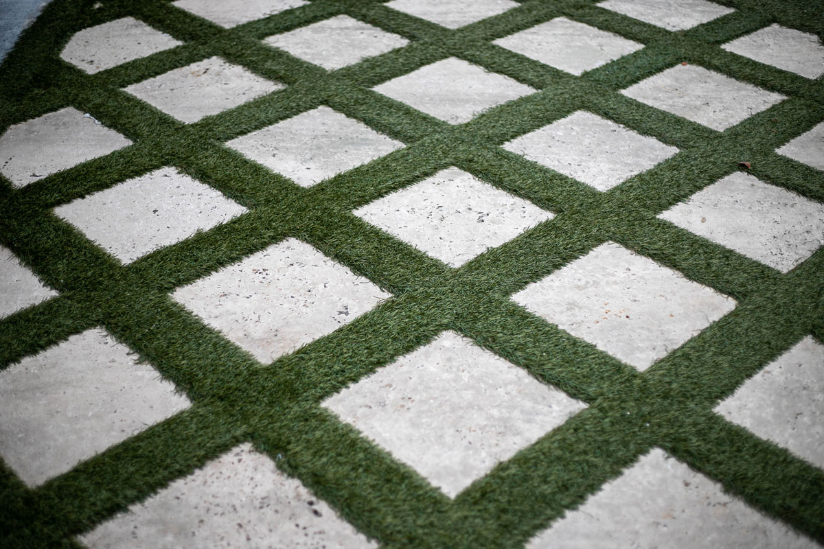 Grass and Stone Pattern Drive Way in a Luxury Home