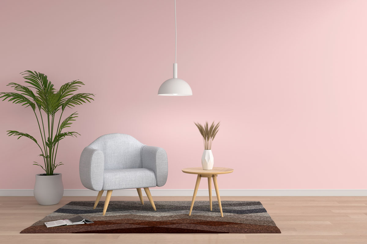 Gray sofa in pink living room