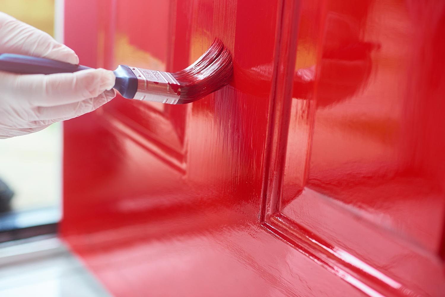 Homeowner gives his front door a new bold lick of paint