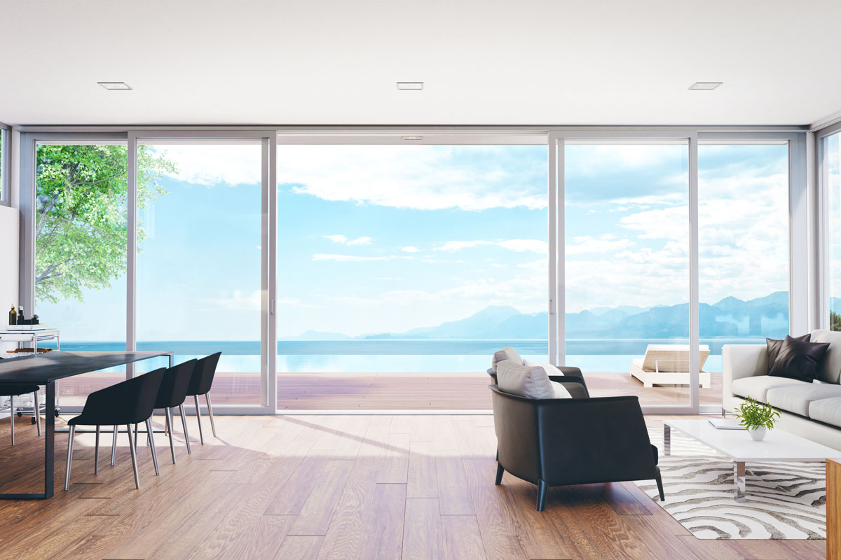 Interior an ultra modern living room with a scenic view of an ocean