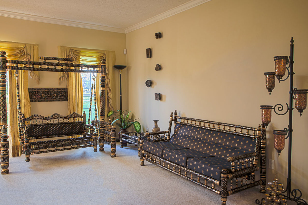 Interior view of a room with traditional Sankheda furniture from Western India