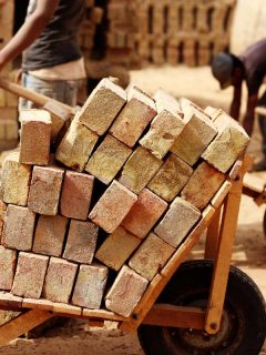 Loading brick in cart in the brick factory, How Much Does A Brick Weigh?