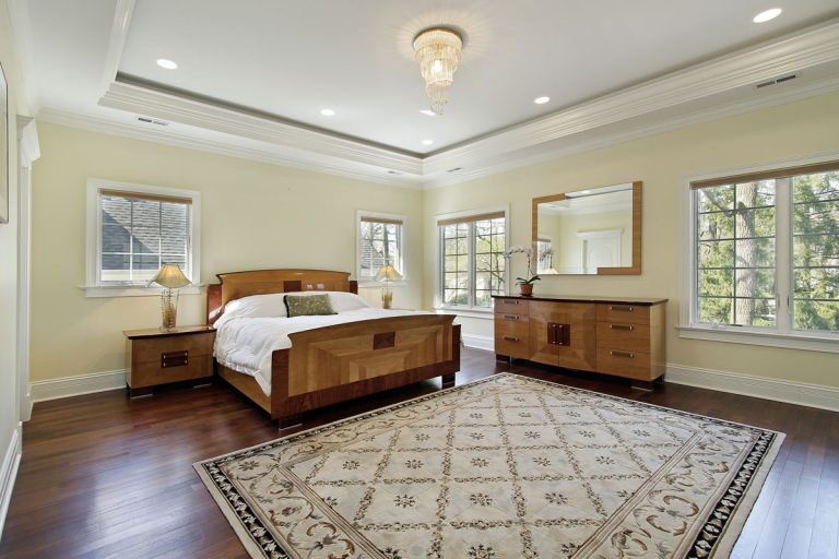 Master bedroom in luxury home with tray ceiling, Does A Tray Ceiling Add Height?