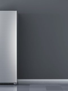 Modern side by side Stainless Steel Refrigerator in a grey wall, How Much Space Between Fridge And Wall?