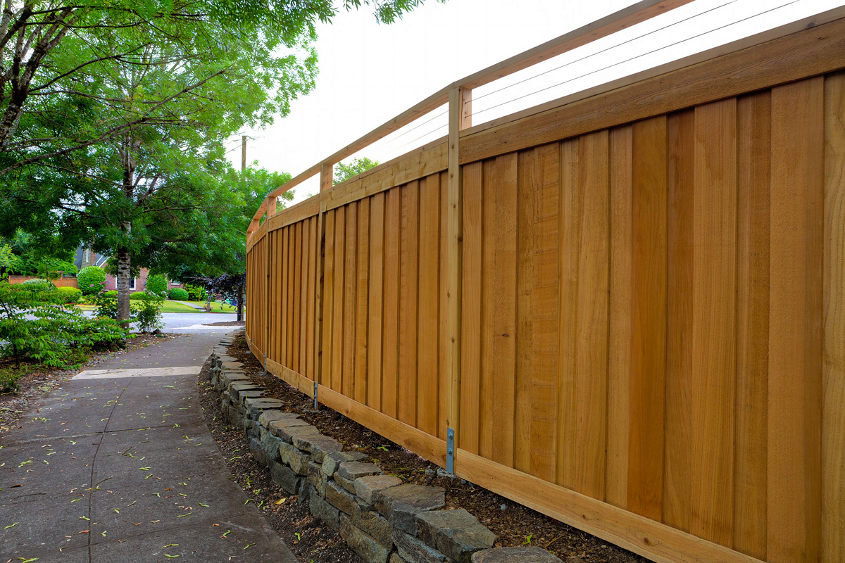 New Cedar Wood Fence around home backyard property landscaping
