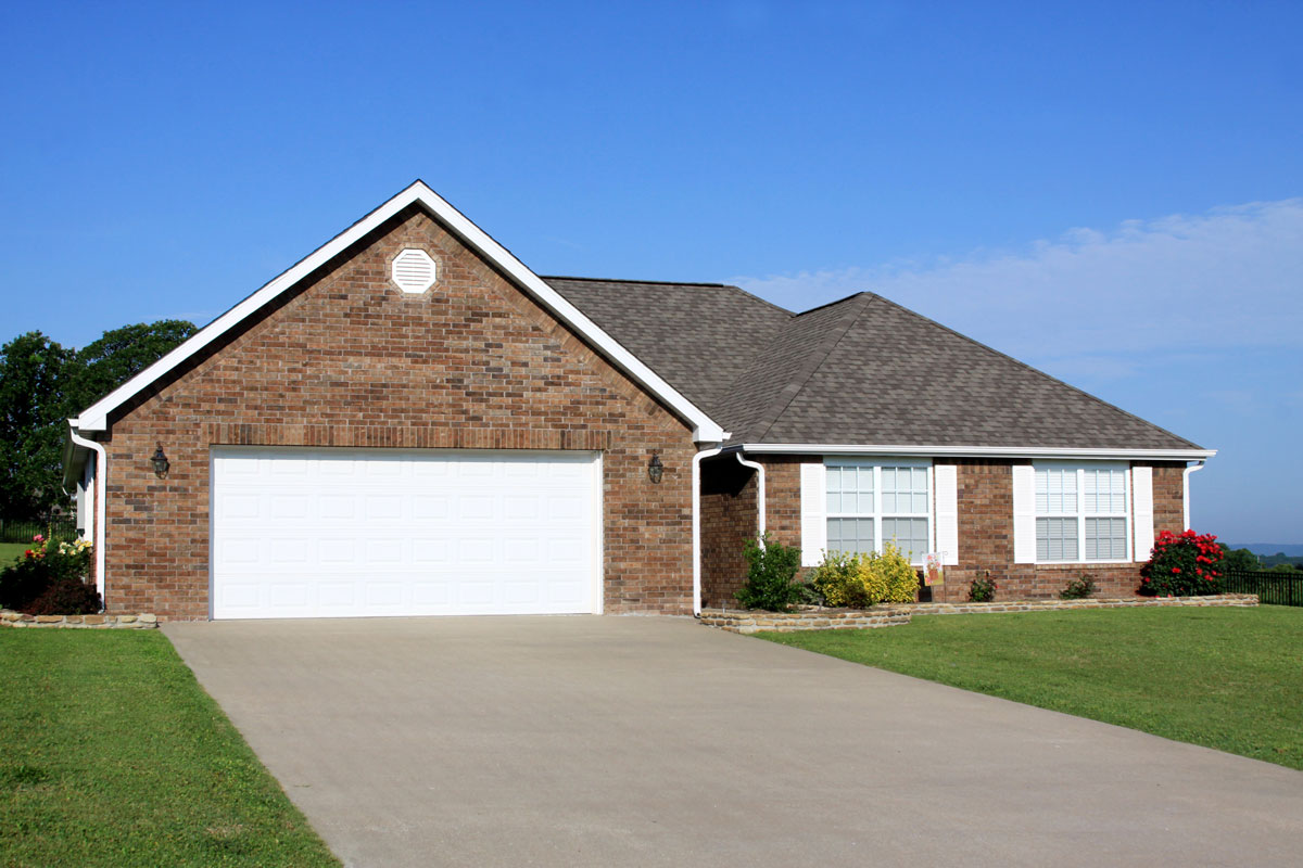 New Construction Generic Brick House with concrete driveway