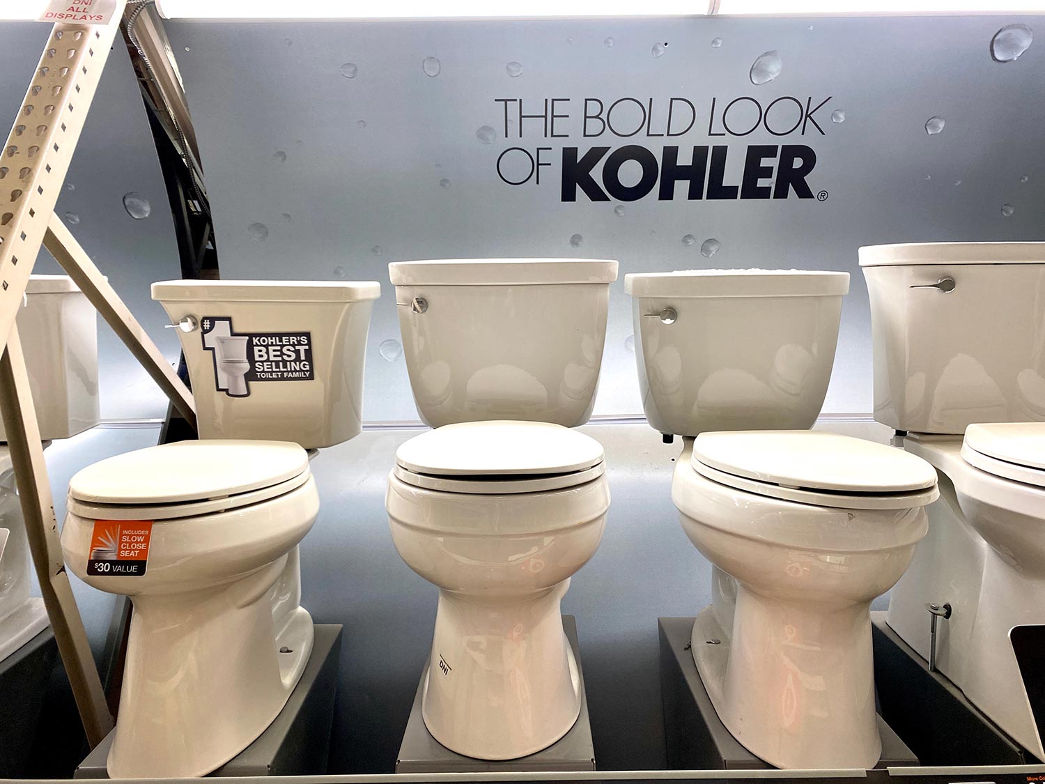 New Kohler toilets on display inside a Home Depot home improvement store