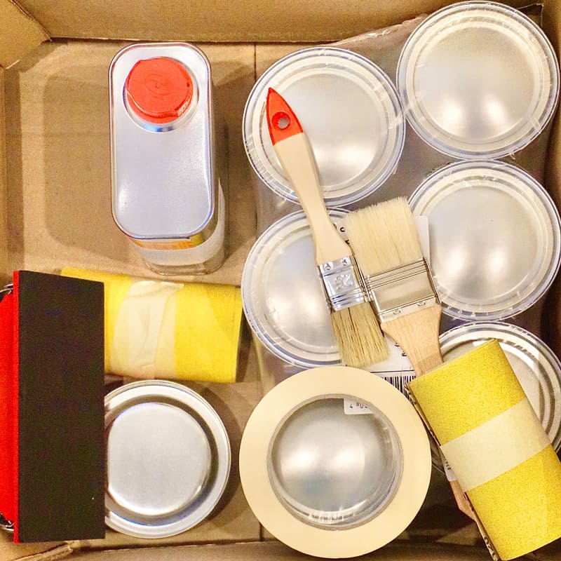 Painting products inside a cardboard box