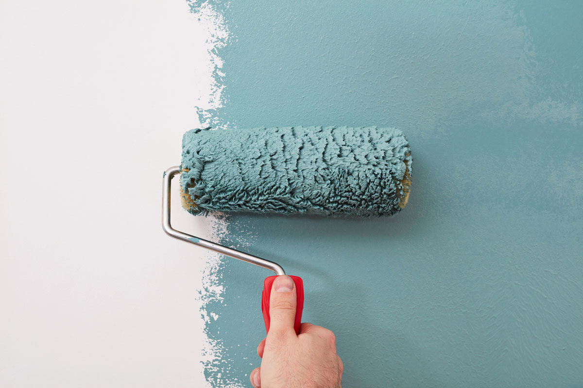 Painting the wall with a turquoise color