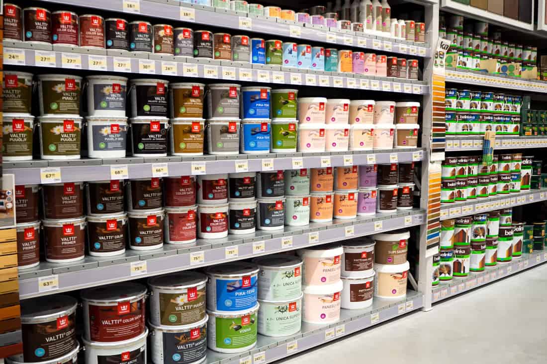  Paints, sealants, silicones are different manufacturers on shelves of building market