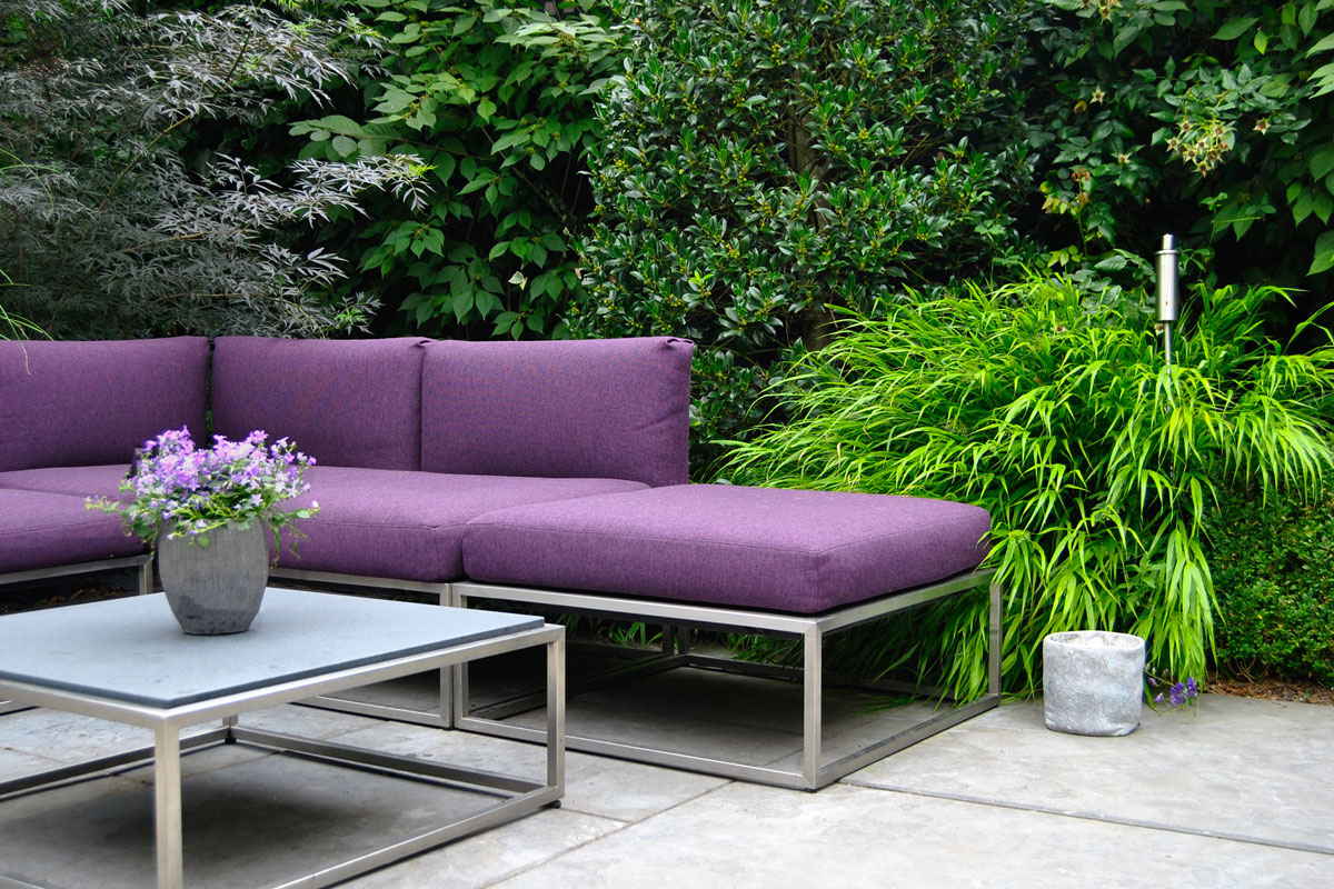 Purple street sofa and a Pot of flowers in the background