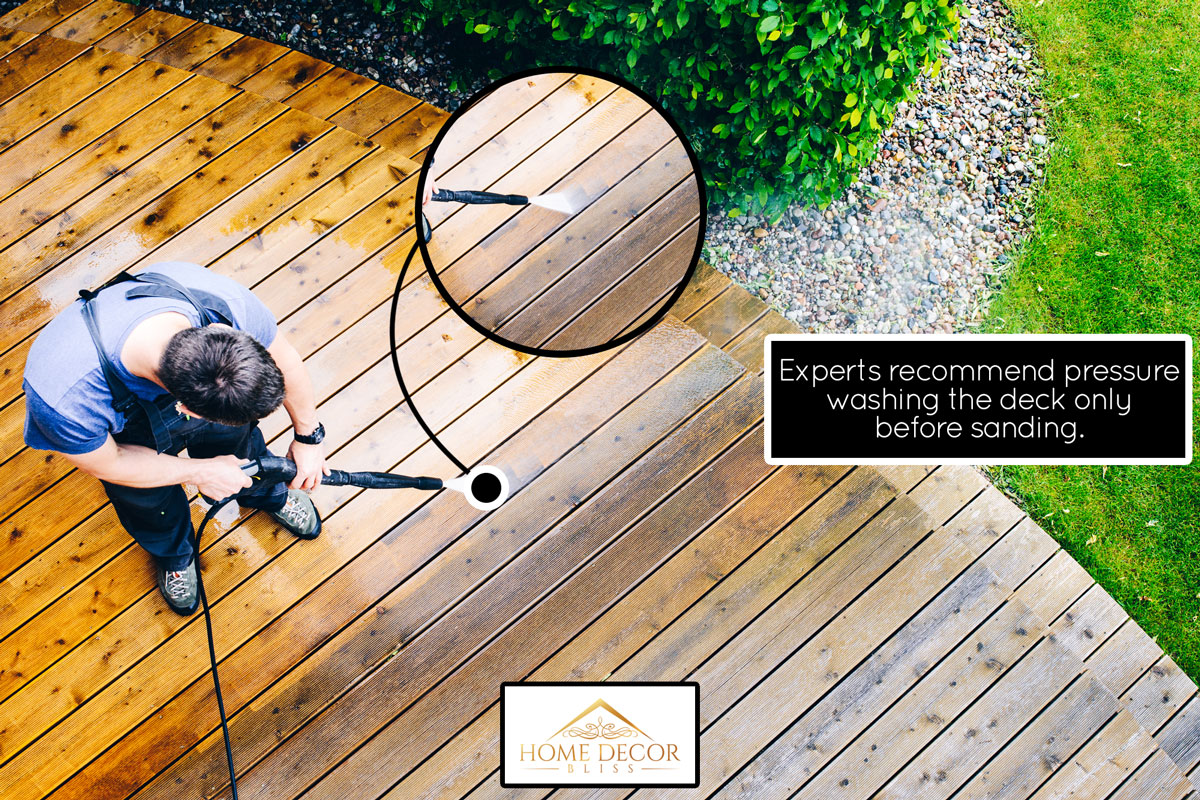 man cleaning the deck with a power washer, Should You Wash Deck After Sanding?