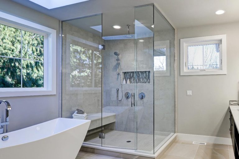 Spacious bathroom in gray tones with heated floors and walk-in shower, Do Steam Showers Need To Be Vented?