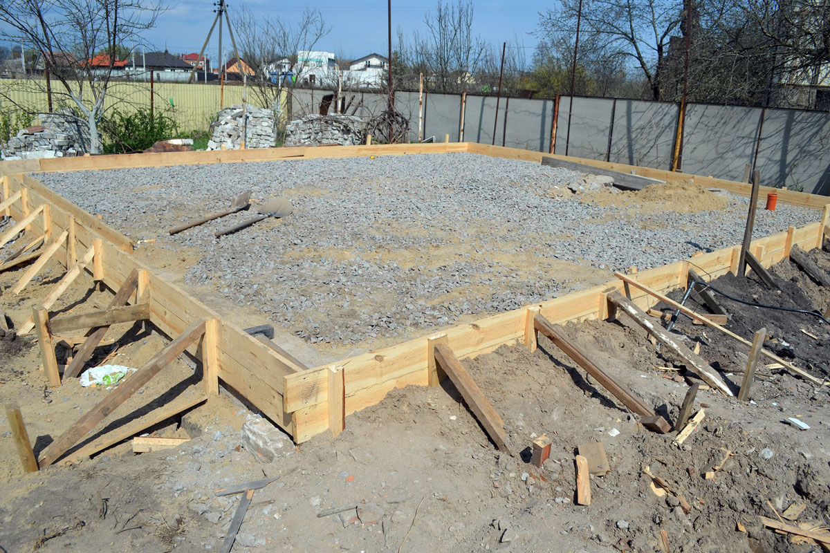 Timber formwork with metal reinforcement for pouring concrete and creating a solid foundation for a building or house