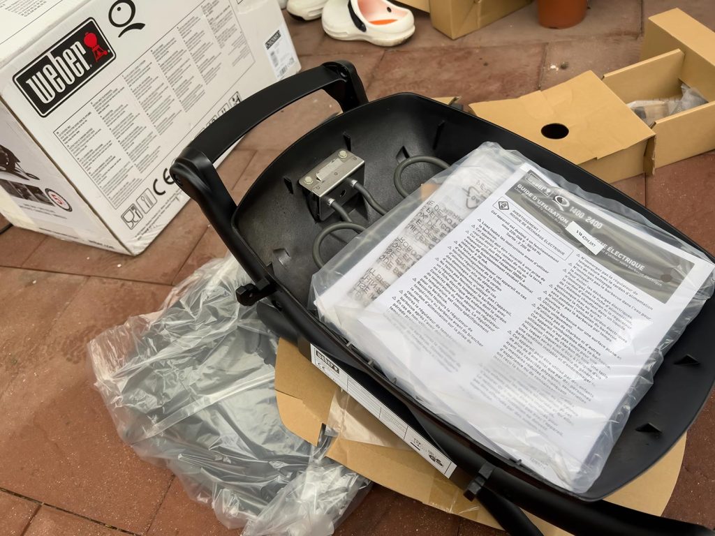 Unboxing of new Weber electric barbecue with instructions manual