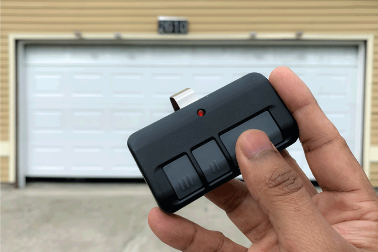 Using a garage door remote to open a garage door. How To Program A HomeLink Garage Door Opener