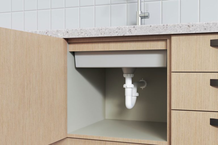 Water pipes under sink, kitchen cabinets with open doors, Where to Store your Full Garbage Bags