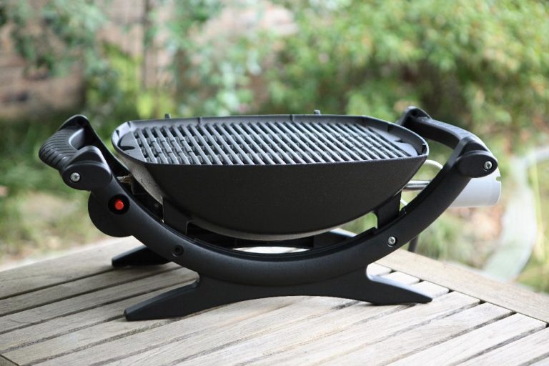 Weber barbecue grill in a garden setting, How To Find The Model Number On A Weber Grill